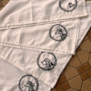 Hand embroidered white napkins with dog portraits